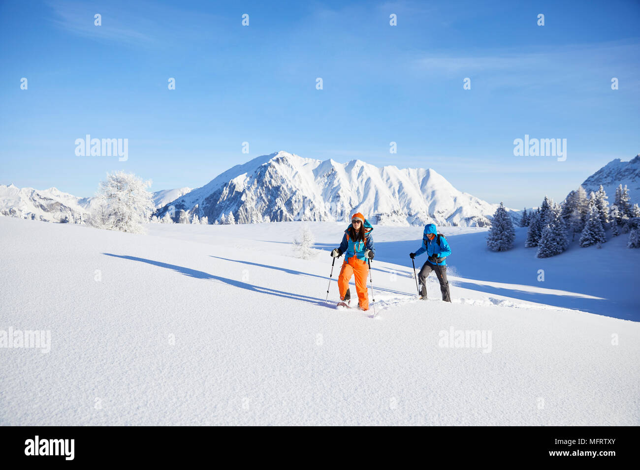 Snowshoeing, hiking in winter landscape, Simmering Alm, Obsteig, Mieming, Tyrol, Austria Stock Photo