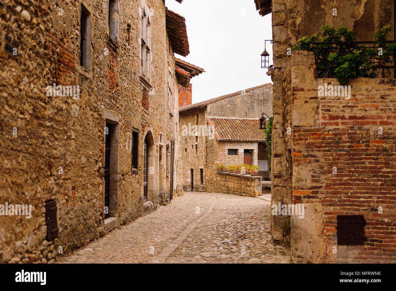 Narrow street in Perouges, France, a medieval walled town, a popular ...