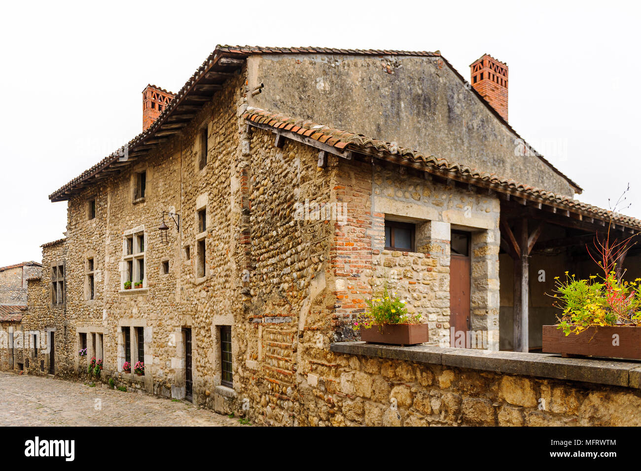 Old stone house in Perouges, France, a medieval walled town, a popular ...