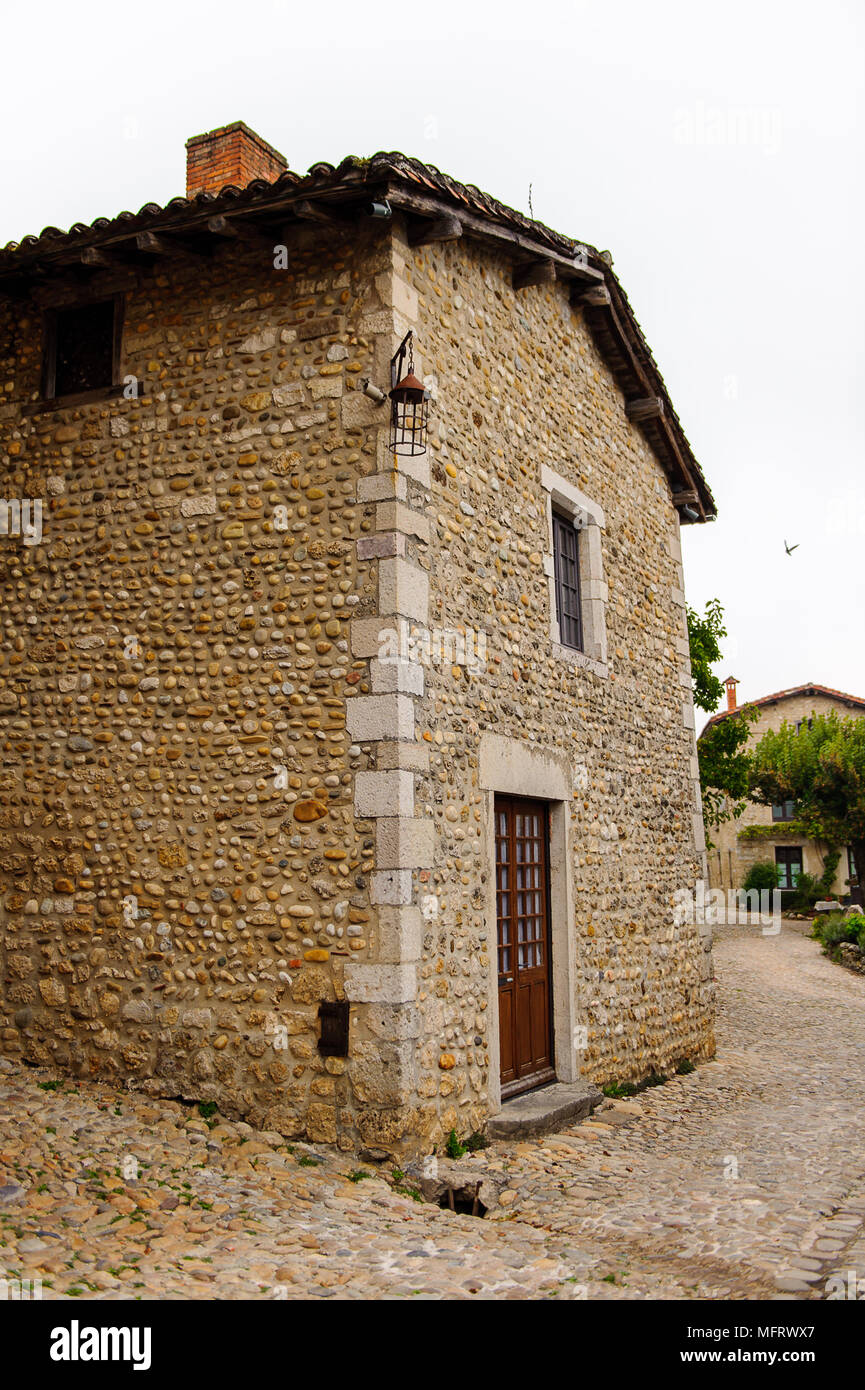 Narrow street in Perouges, France, a medieval walled town, a popular ...