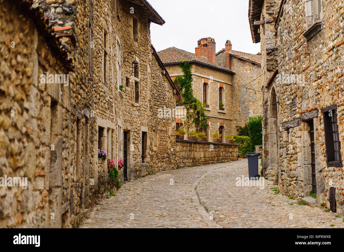 Narrow street in Perouges, France, a medieval walled town, a popular ...