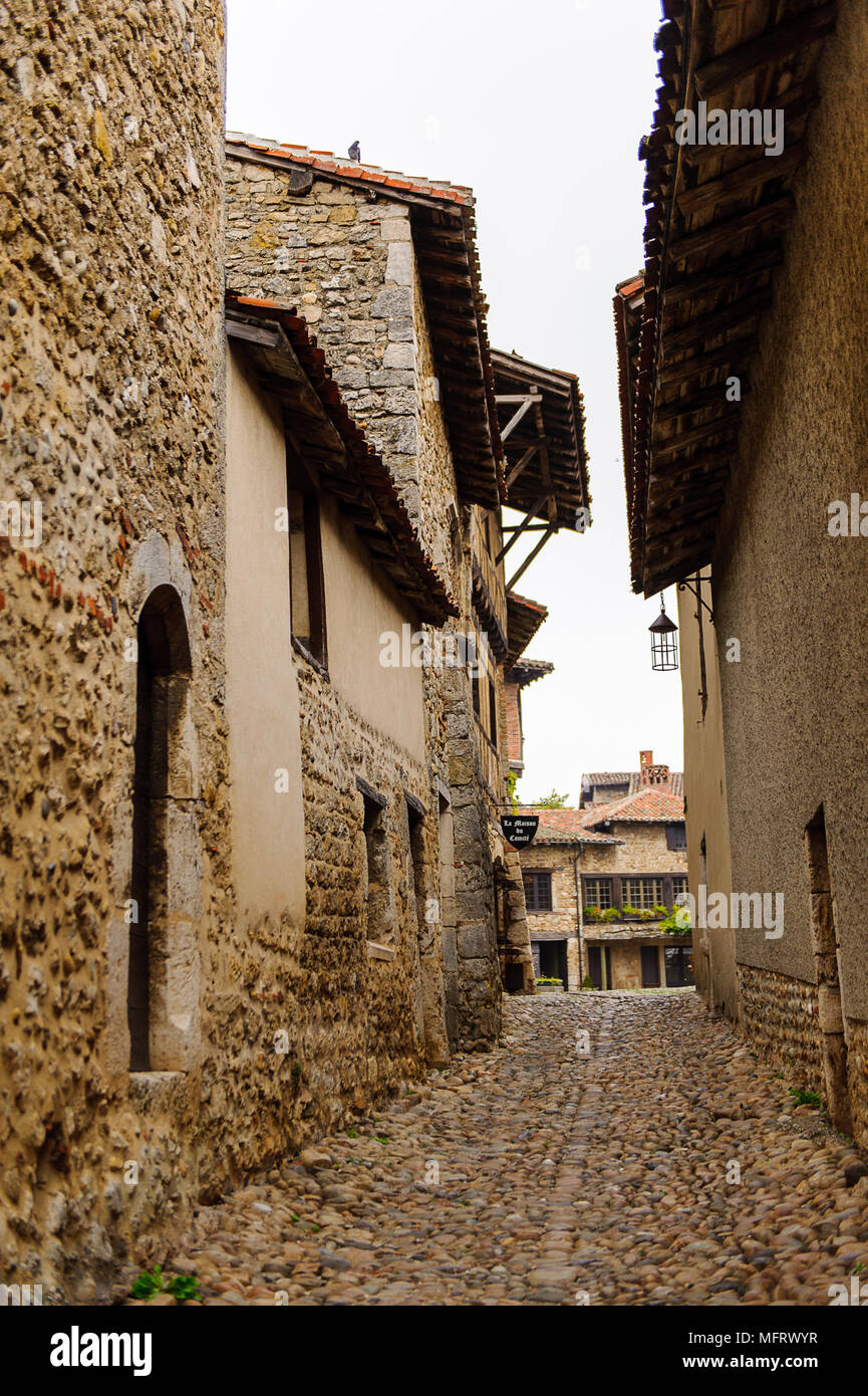 Narrow street in Perouges, France, a medieval walled town, a popular ...