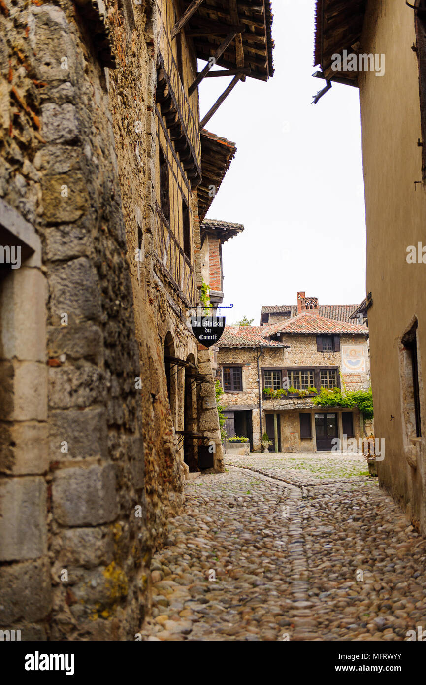 Narrow street in Perouges, France, a medieval walled town, a popular ...