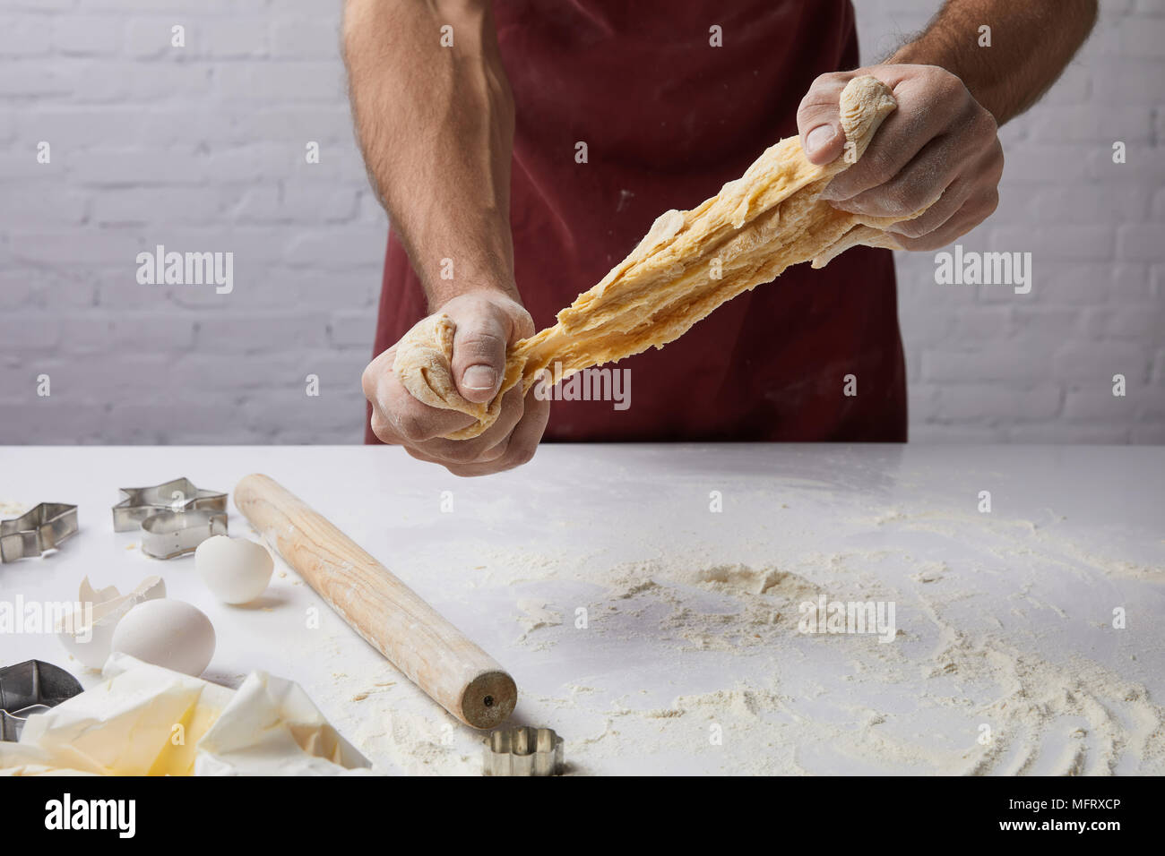 cropped image of chef preparing dough Stock Photo