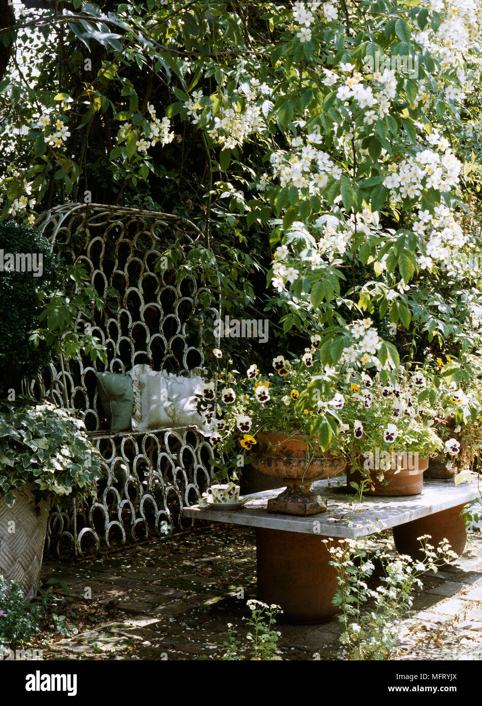 Garden Detail Paved Patio Area Stone Table Marble Top Metal Seat