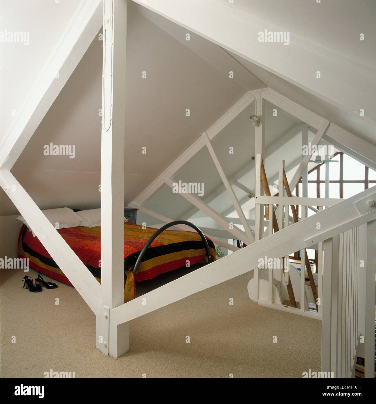 Attic Bedroom In Beach House With Painted White Beams Double Bed