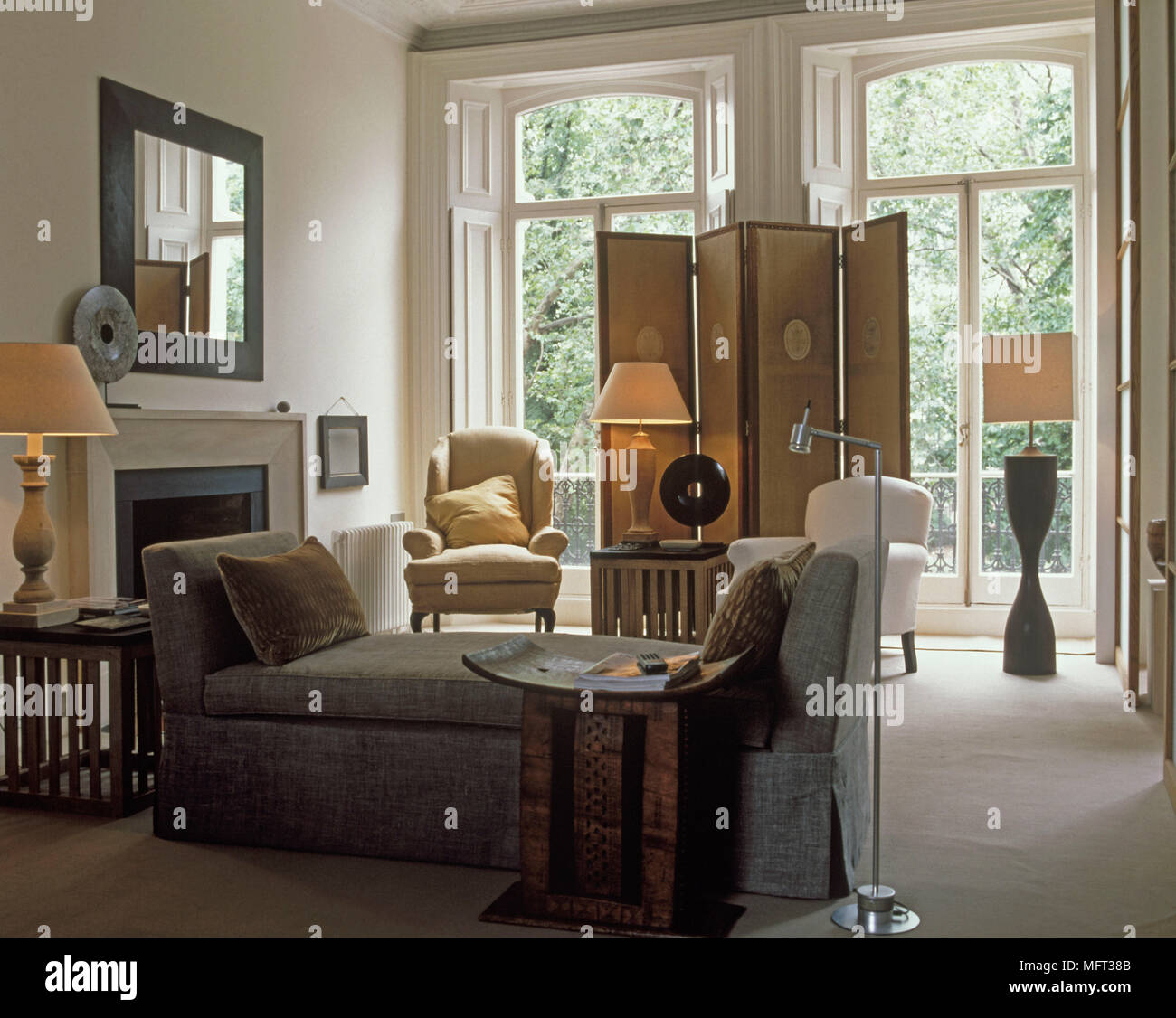 Modern Sitting Room Cream Walls Windows Screen Fireplace