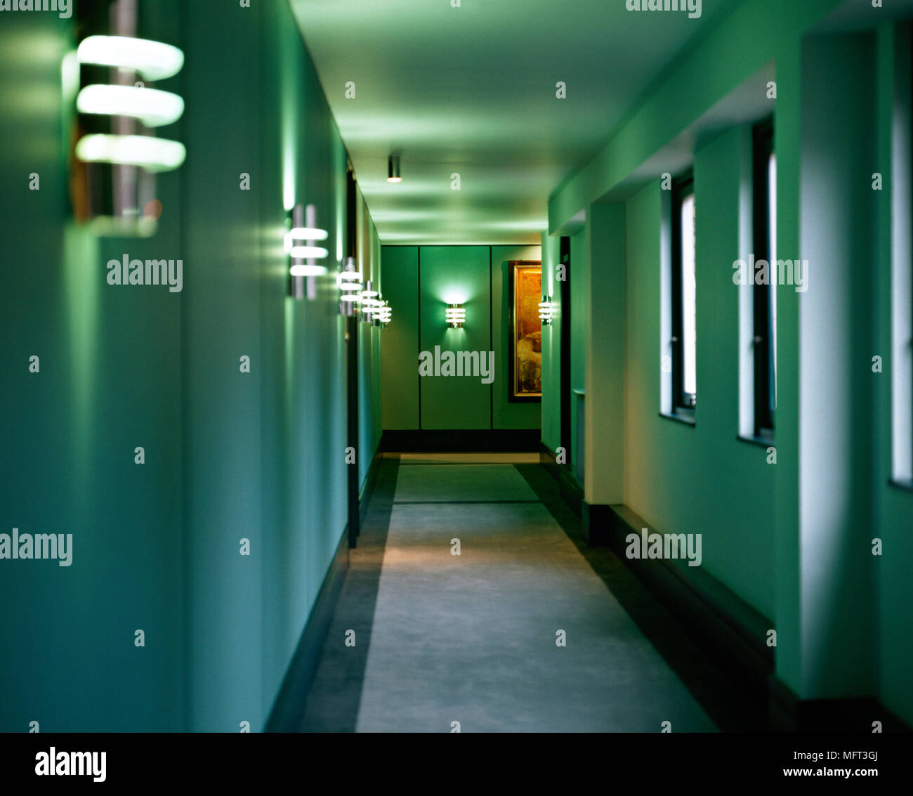 Hallway to modern apartment lit wall lights Interiors halls hallways
