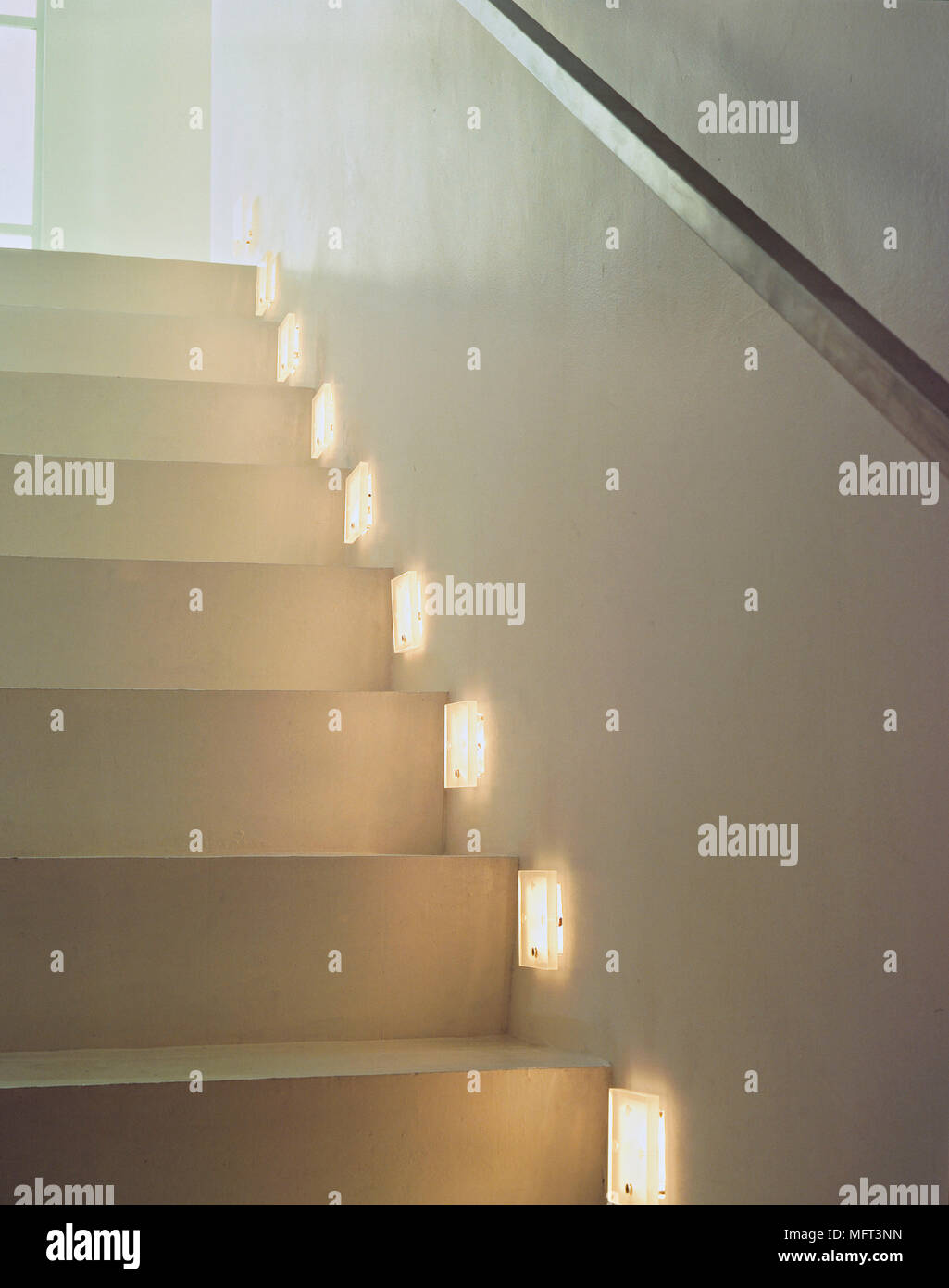 Close-up view of modern style staircase with low-level wall lighting Stock Photo