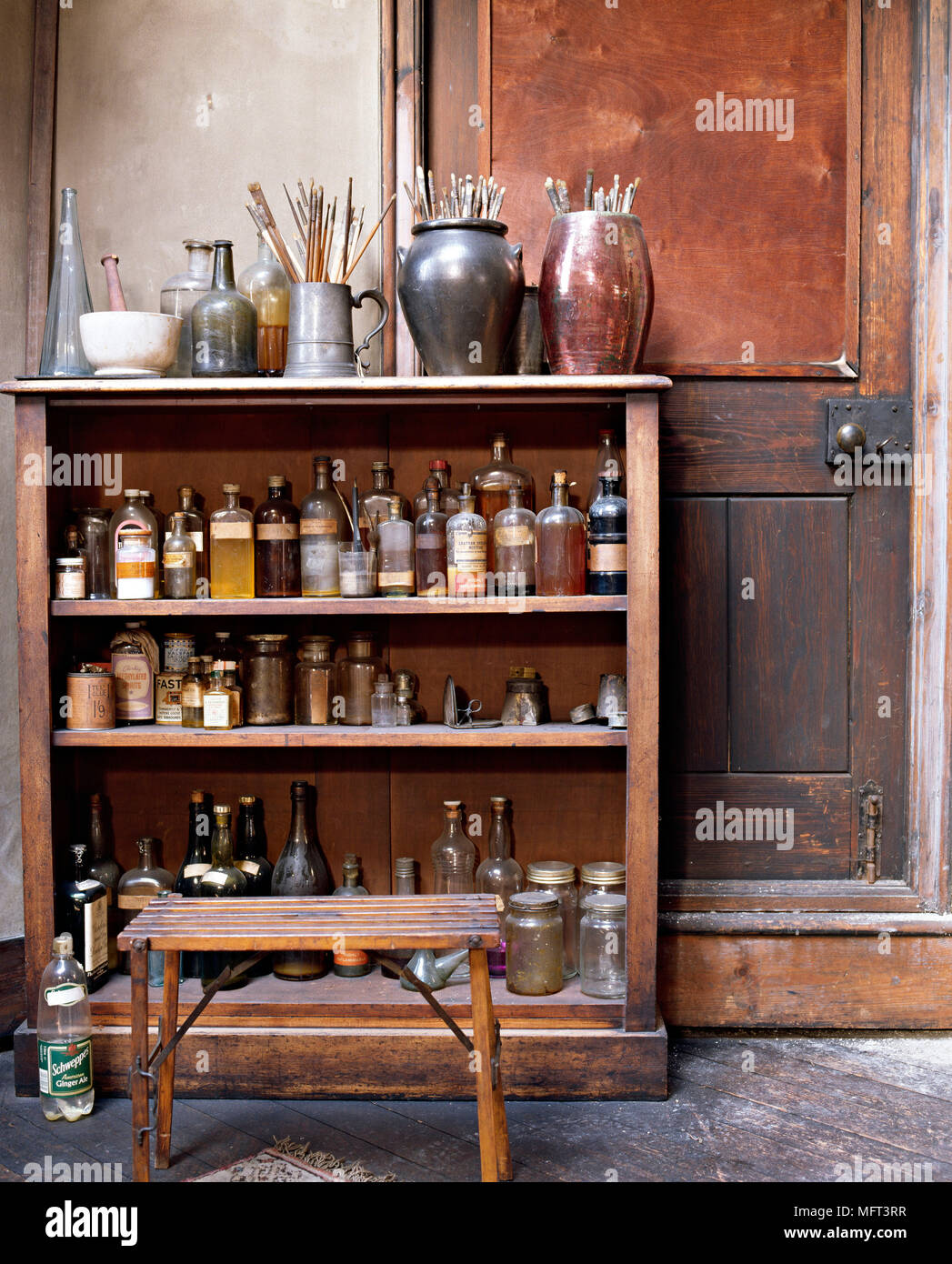 Artists studio with an old fashioned traditional feel art materials paints brushes  interiors detail period colours Stock Photo