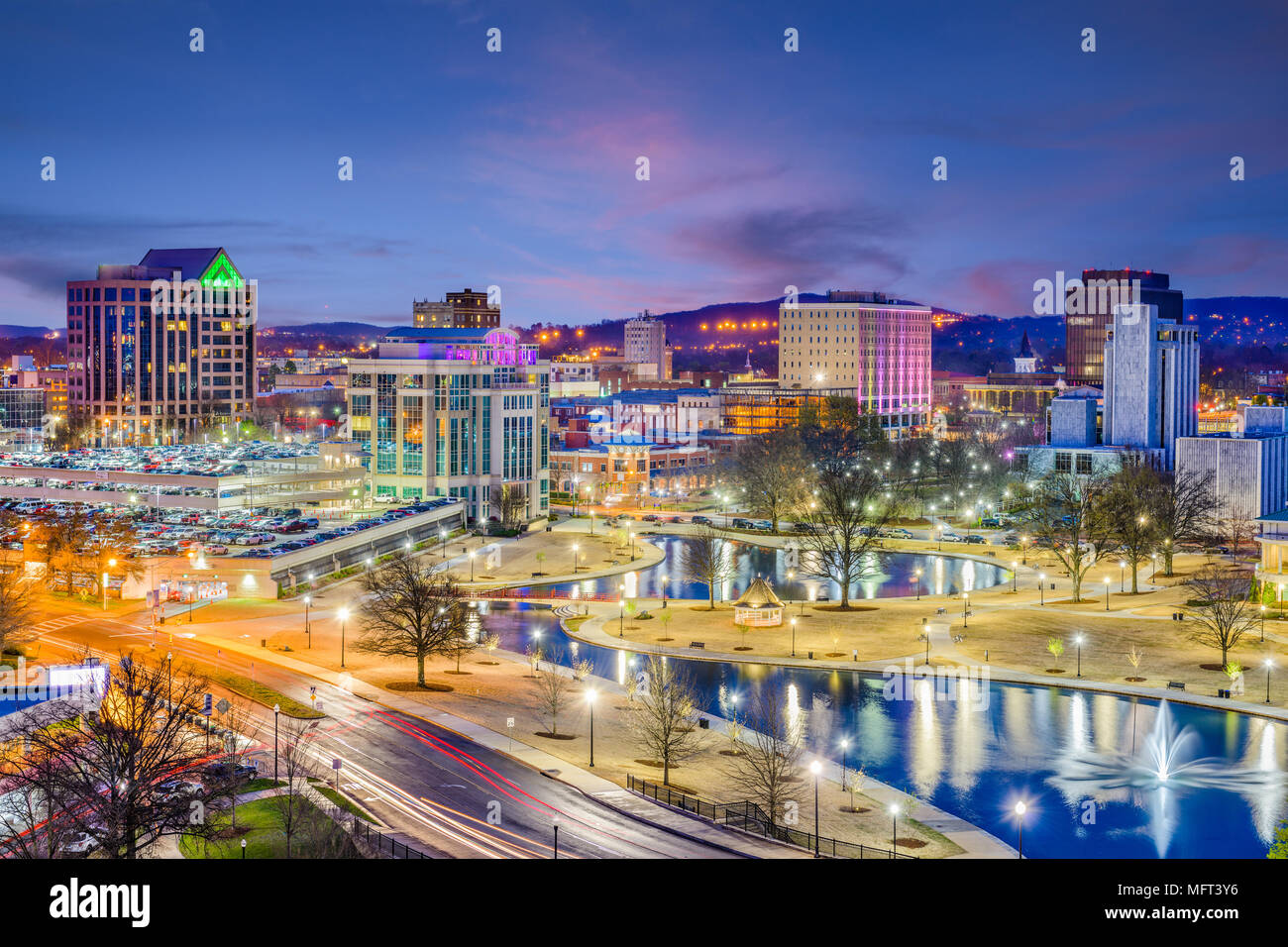 Huntsville Alabama USA park and downtown cityscape at twilight Stock Huntsville Alabama USA park and downtown cityscape at twilight Stock
