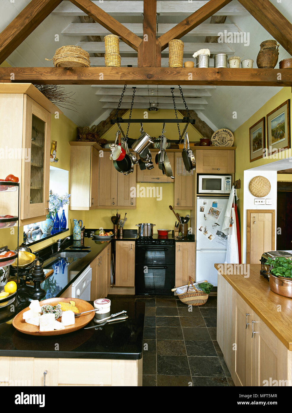 Kitchen With Exposed Ceiling Beams Wooden Units With