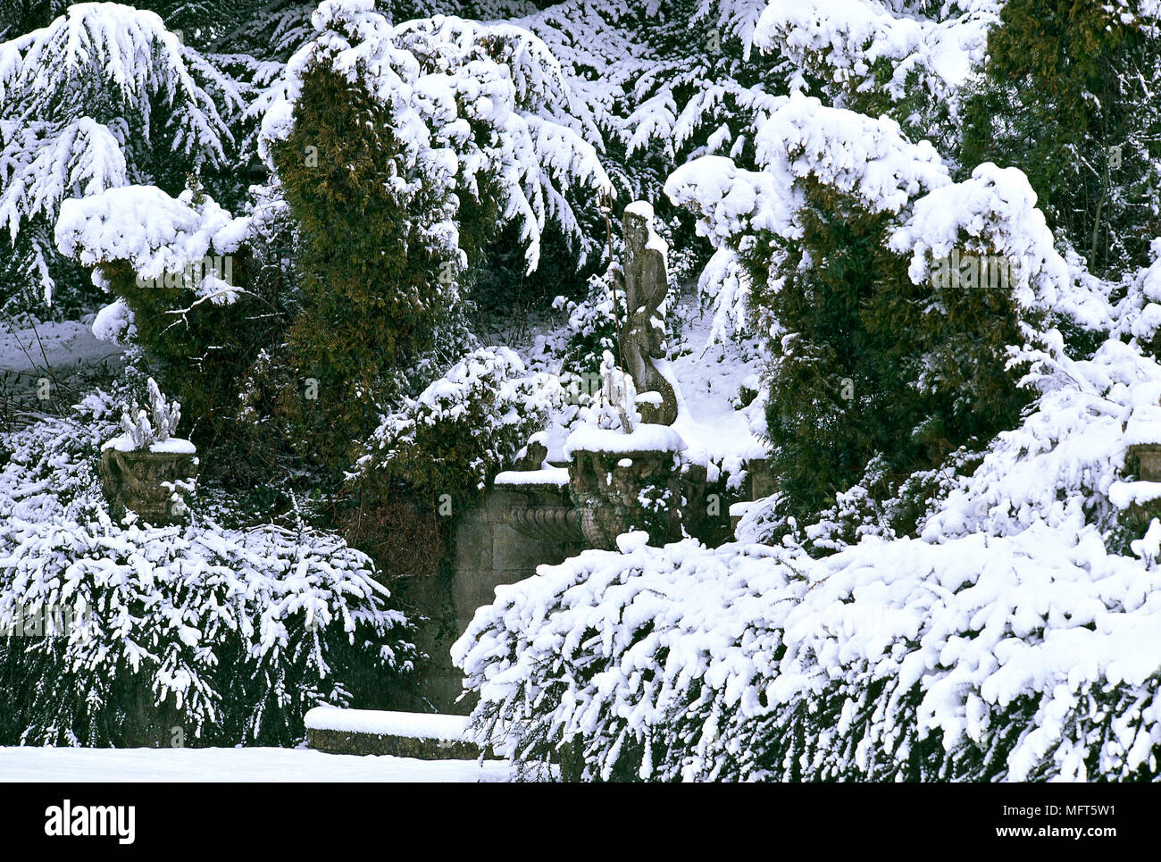 Crowe Hall, snow covered garden and statue Stock Photo - Alamy