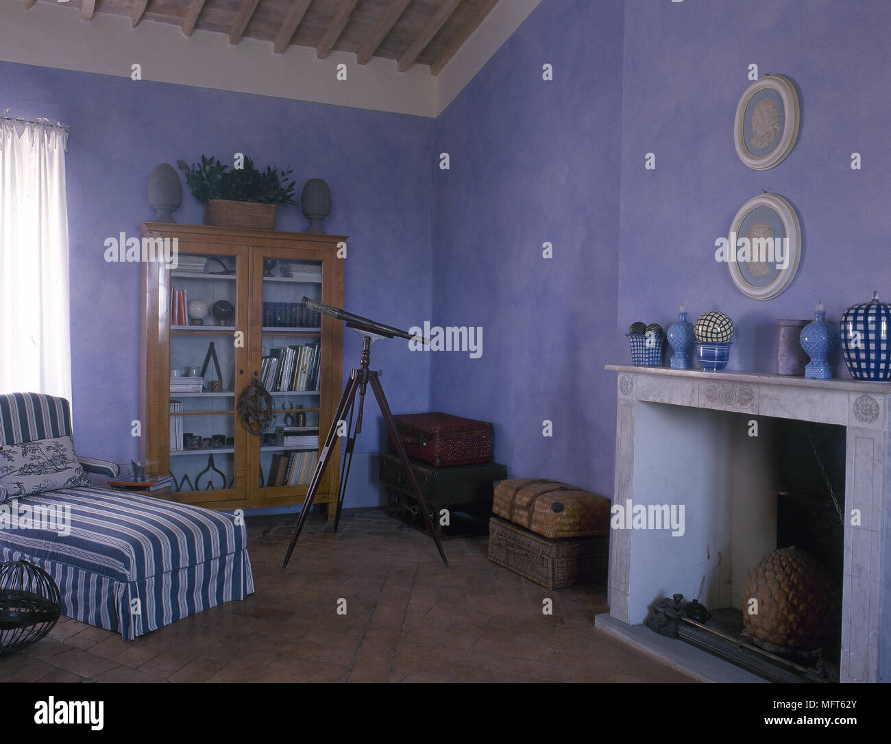 Rustic Blue Bedroom With Beamed Ceiling And Upholstered Day