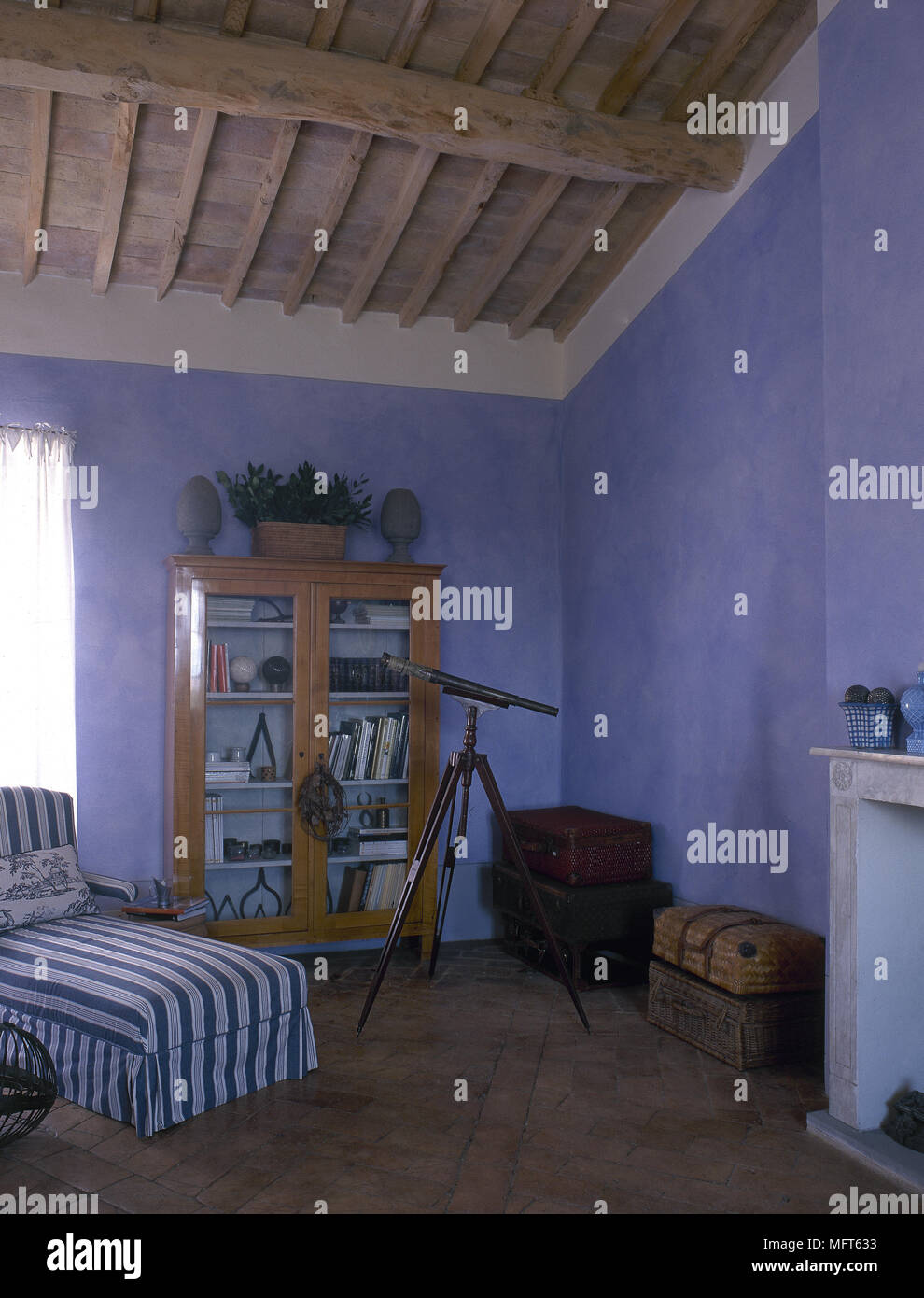 Rustic Blue Bedroom With Beamed Ceiling And Upholstered Day