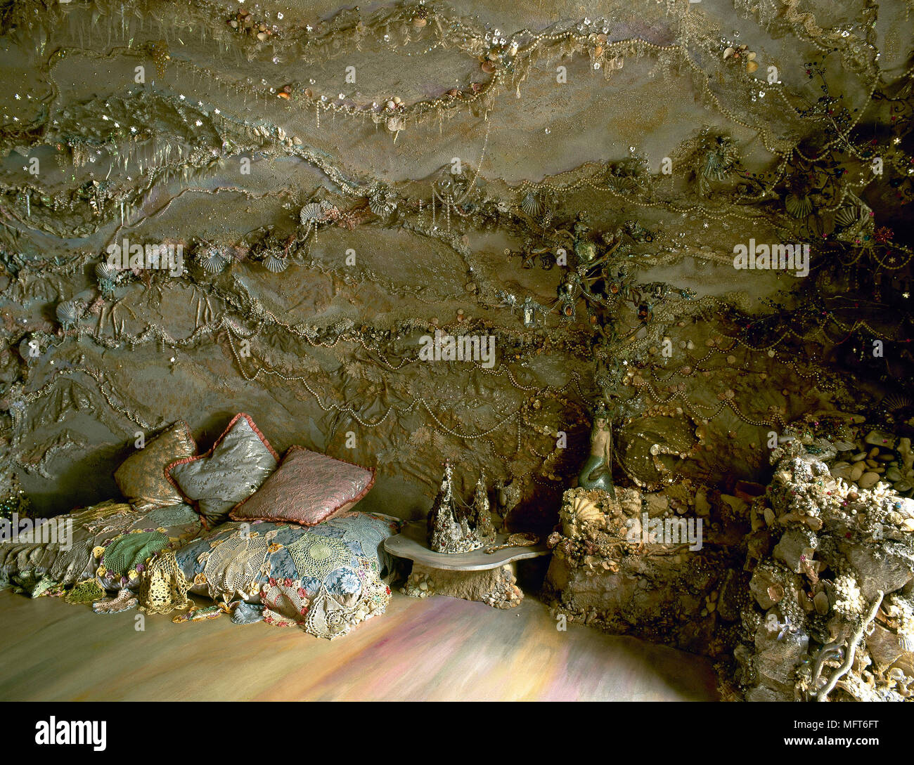 Pearlescent cushions on the floor of a grotto. Stock Photo