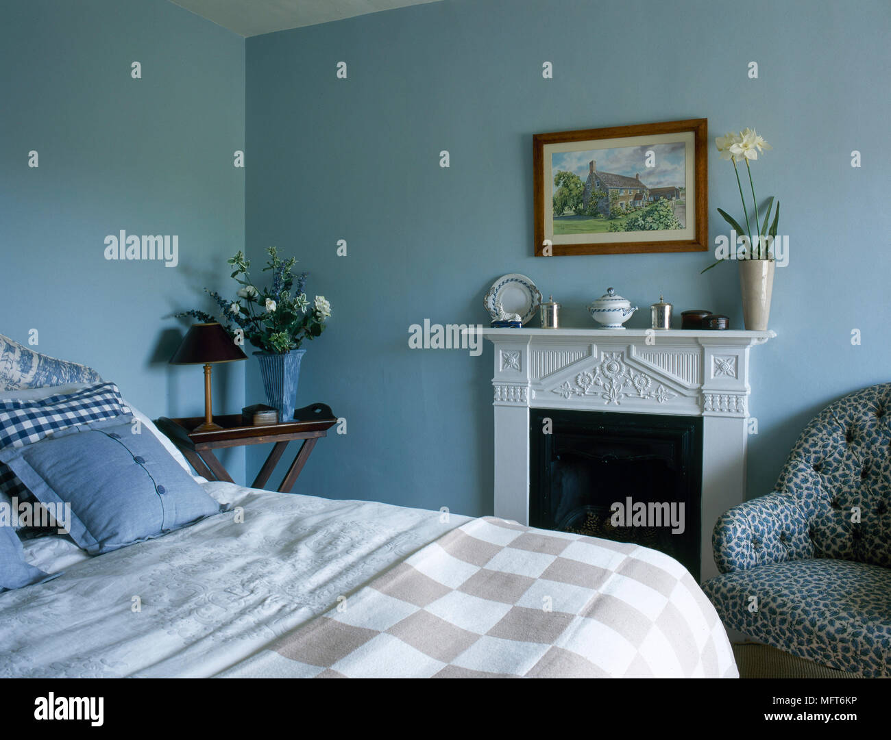 Blue Country Cottage Bedroom With Fireplace Chequered Bedding