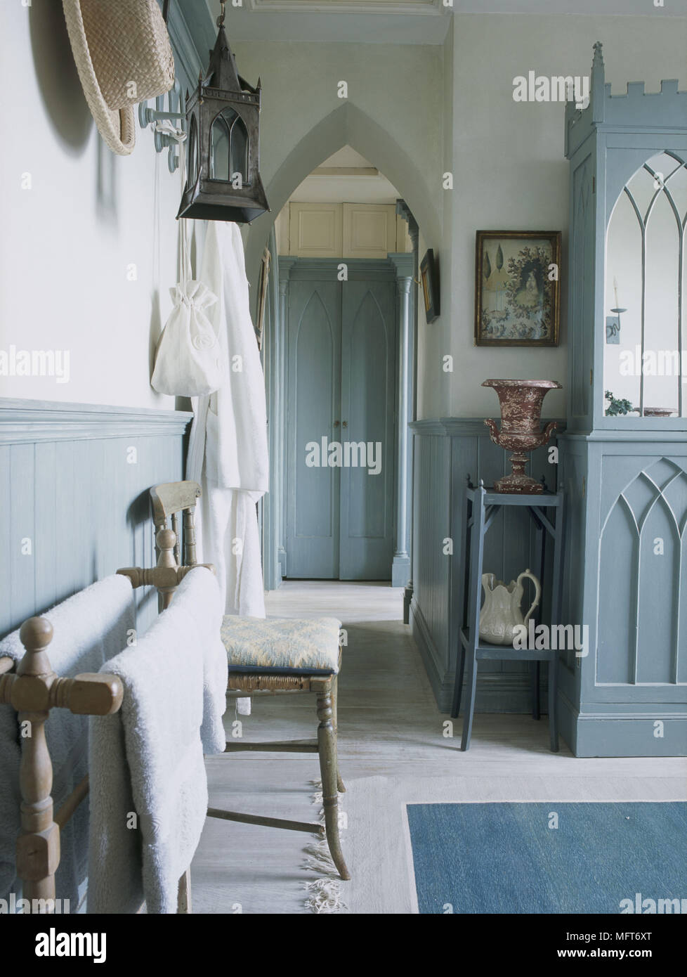 A detail of a traditional country blue bathroom painted gothic A detail of a traditional country blue bathroom painted gothic