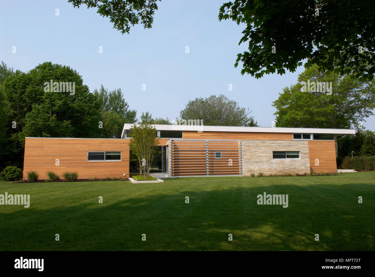 Exterior of new build single storey house and garden Stock Photo