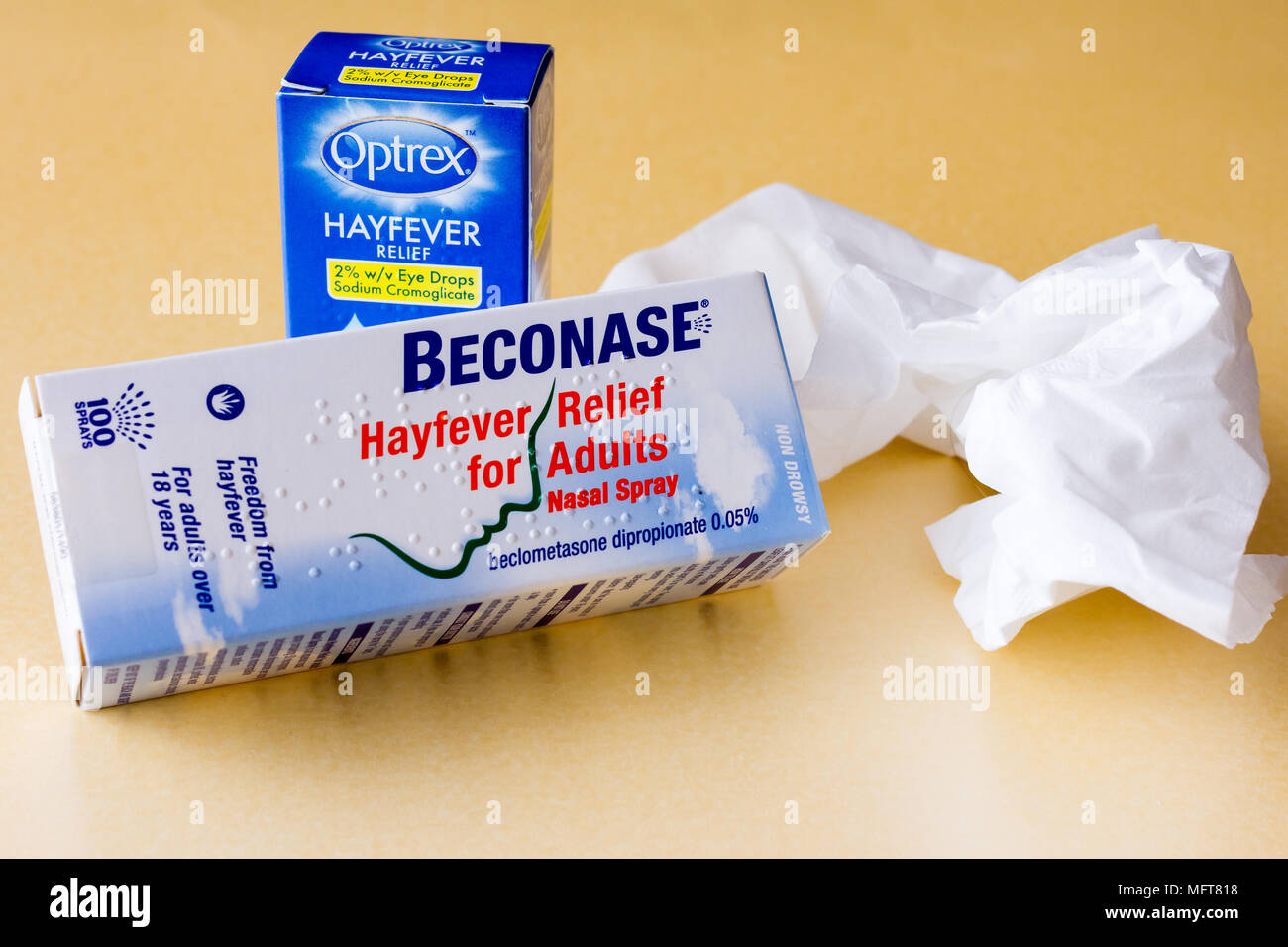 Over the counter medication for hayfever allergies, Beconase nasal spray, a used tissue and Optrex hayfever eye drops, England, United Kingdom Stock Photo