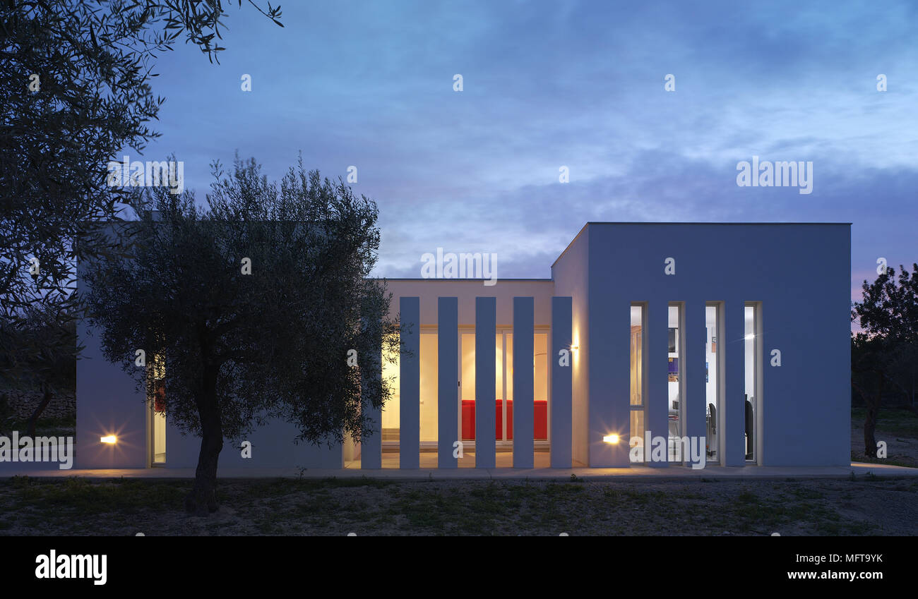 Exterior of modern house at night Stock Photo - Alamy