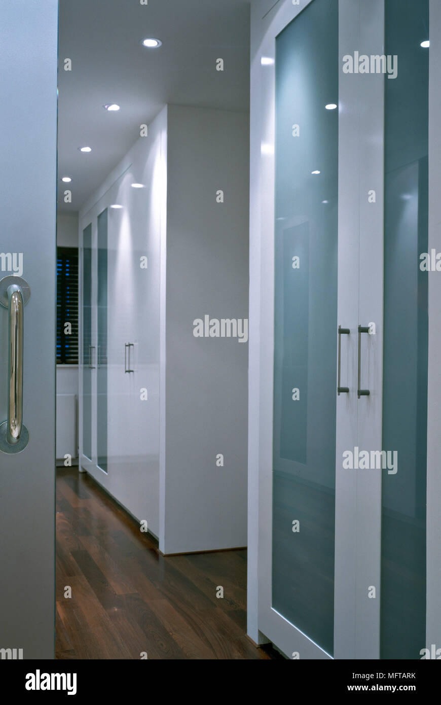 Dressing Room With Built In Wardrobe Drawers And Cupboard Units
