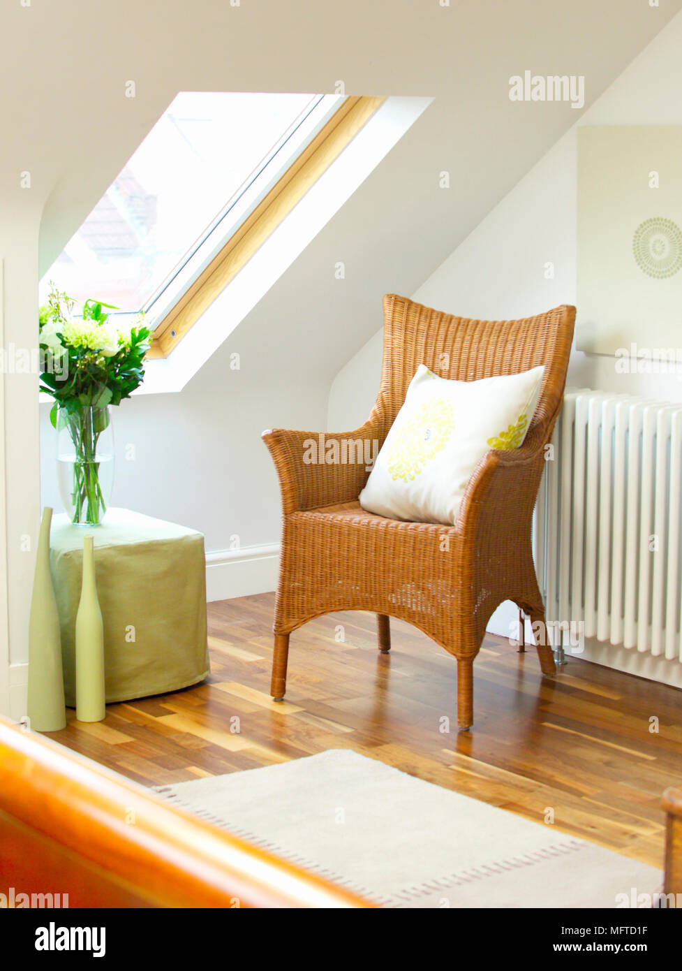 Country style wicker chair in corner of room Stock Photo Alamy