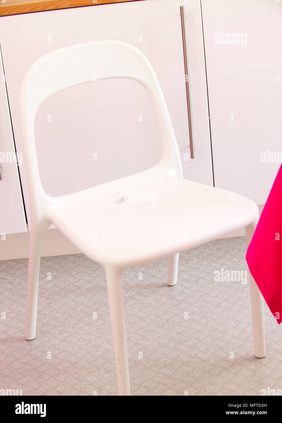 White plastic chair Stock Photo - Alamy