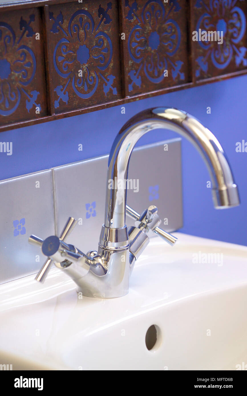 Modern chrome bathroom tap fitting Stock Photo Alamy