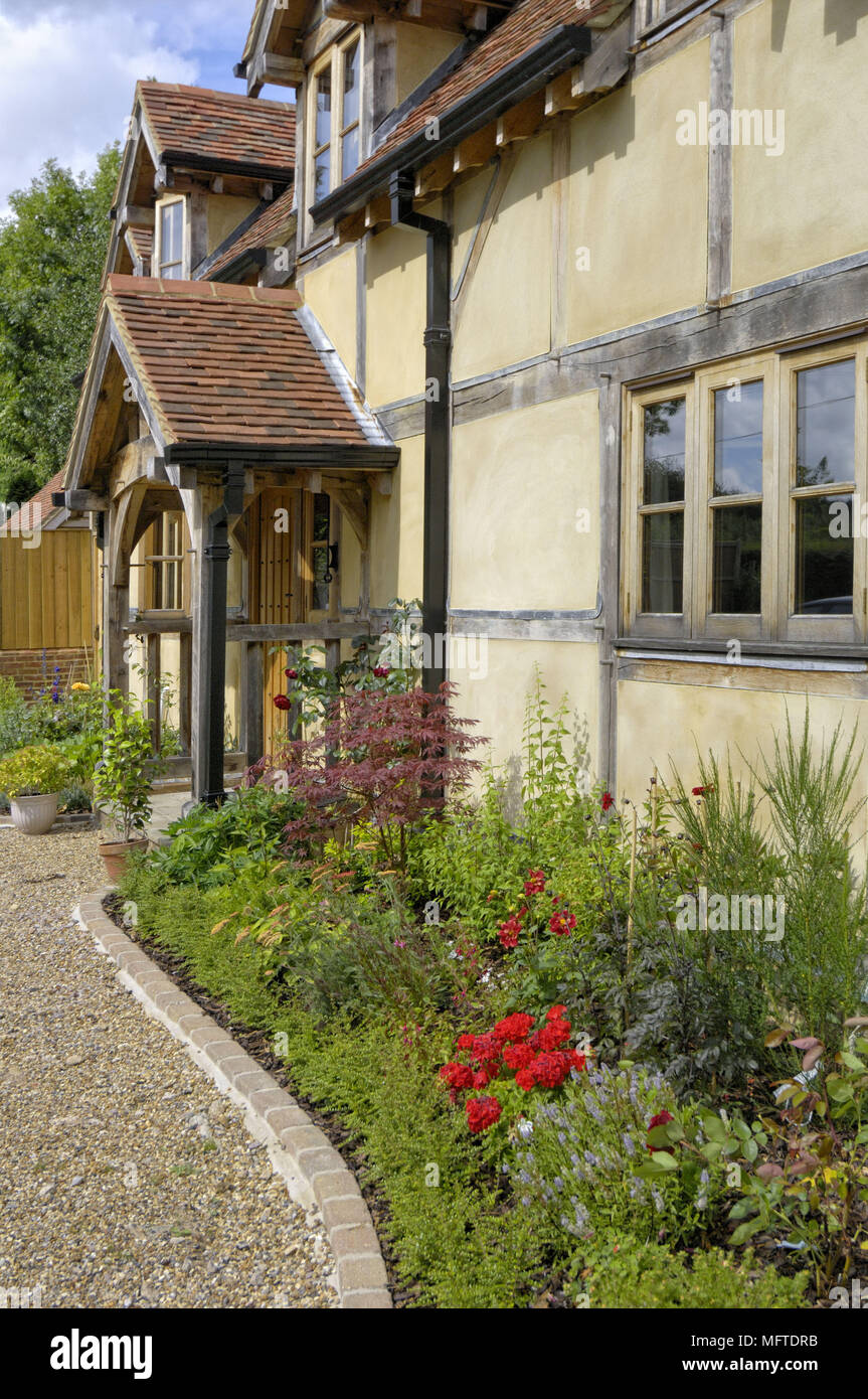Exterior of traditional house and garden Stock Photo - Alamy