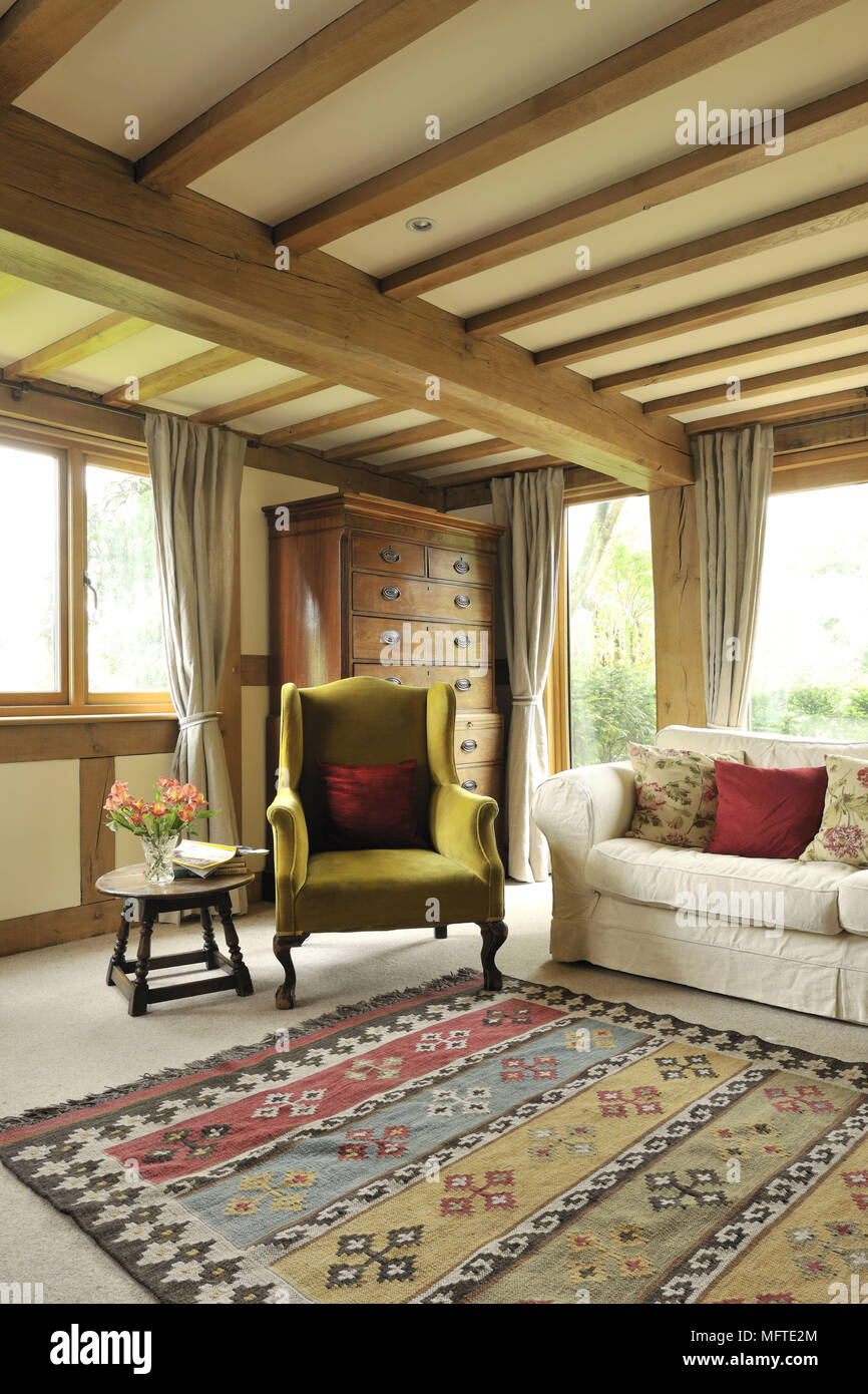 Upholstered Seating In Country Style Sitting Room Stock