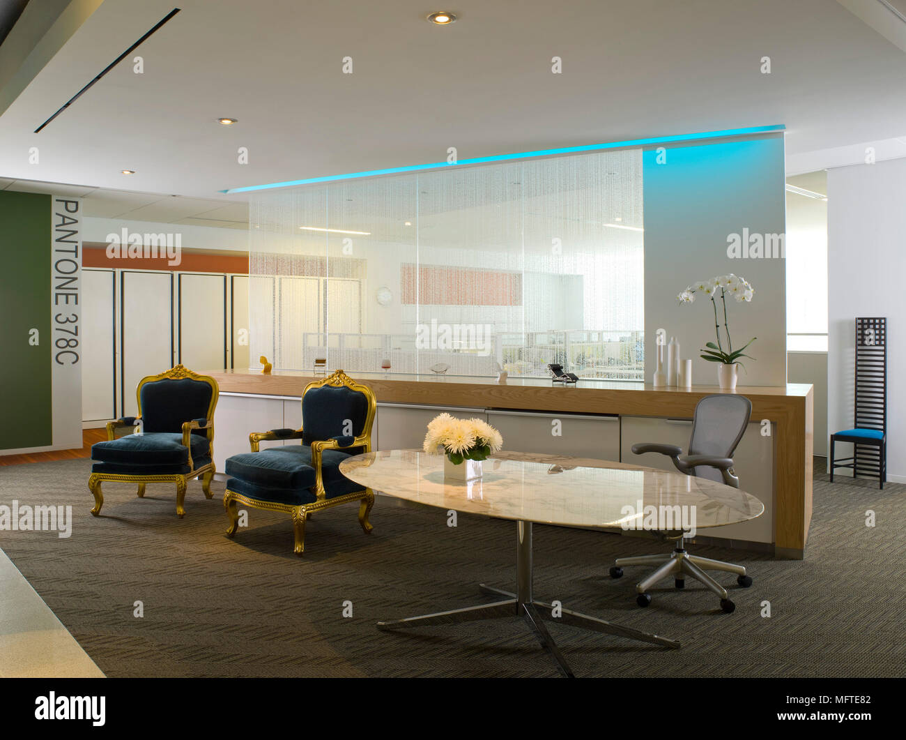 Chair at oval desk in modern office Stock Photo Alamy