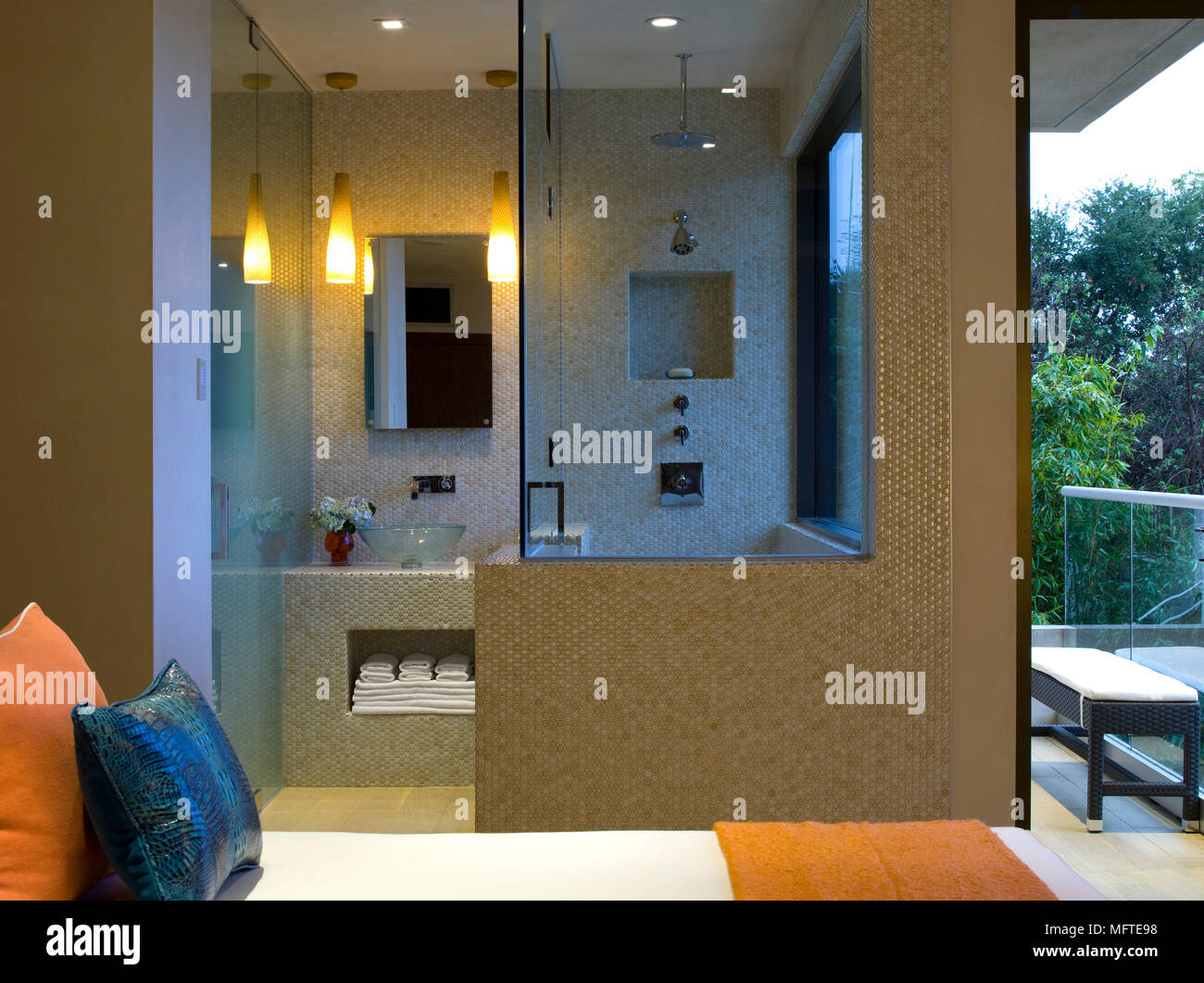 View Into Ensuite Bathroom In Modern Bedroom With Single Bed