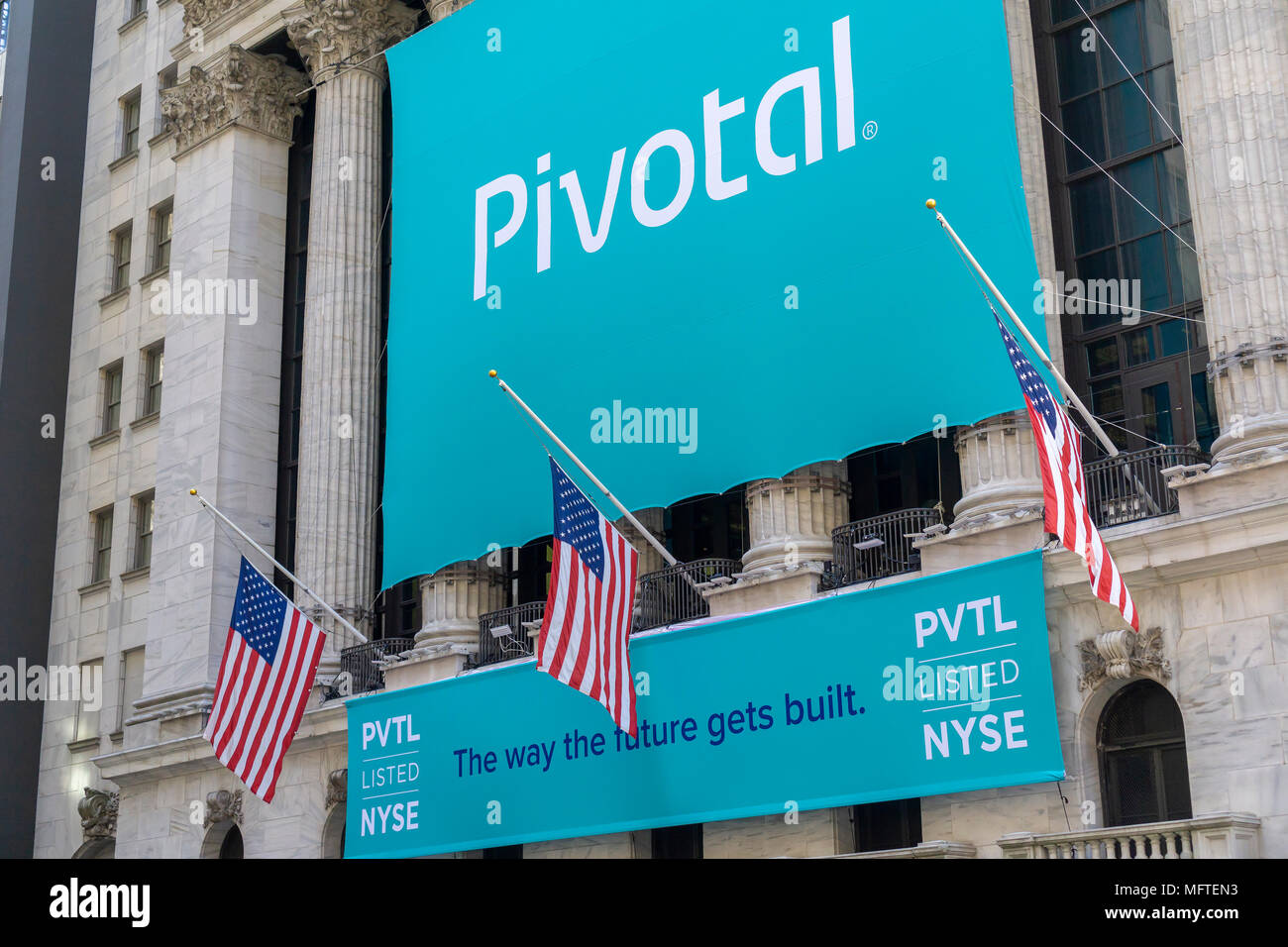 The facade of the New York Stock Exchange is seen on Friday, April 20, 2018 decorated in honor of the debut of trading for Pivotal Software which will trade under PVTL. The company supplies cloud software to build other cloud software and is spun off from EMC and VMware with Dell owning approximately 70% of the stock.  (© Richard B. Levine) Stock Photo