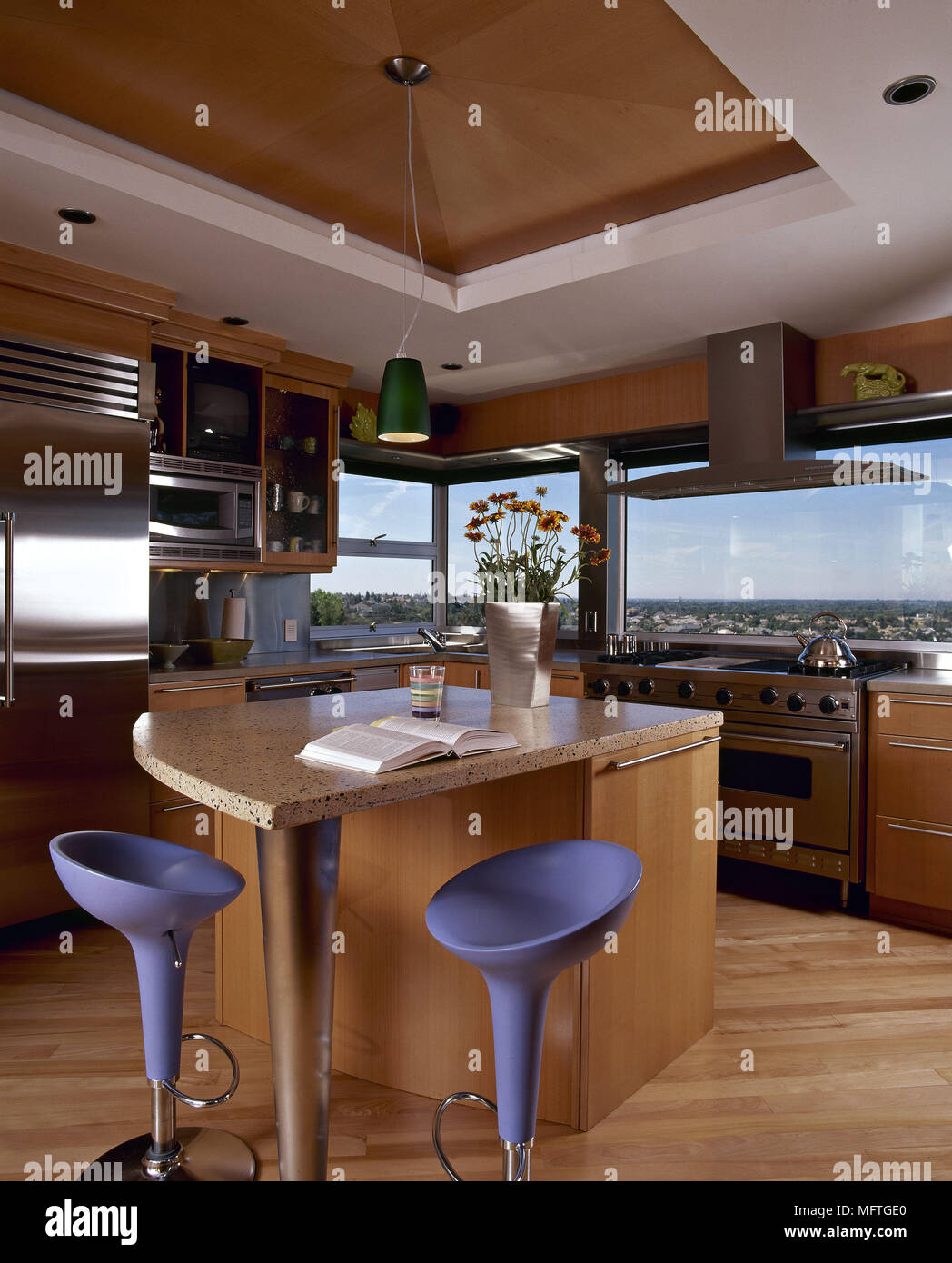 Ultra modern kitchen white units central island breakfast bar stools granite worktops wood floor