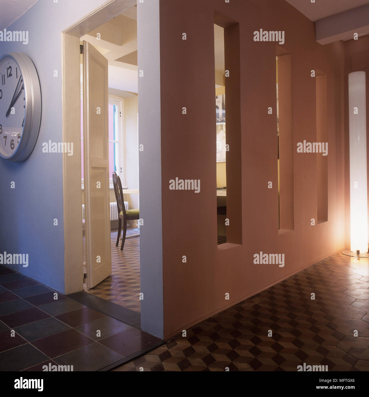 Oversize clock in hallway Stock Photo Alamy
