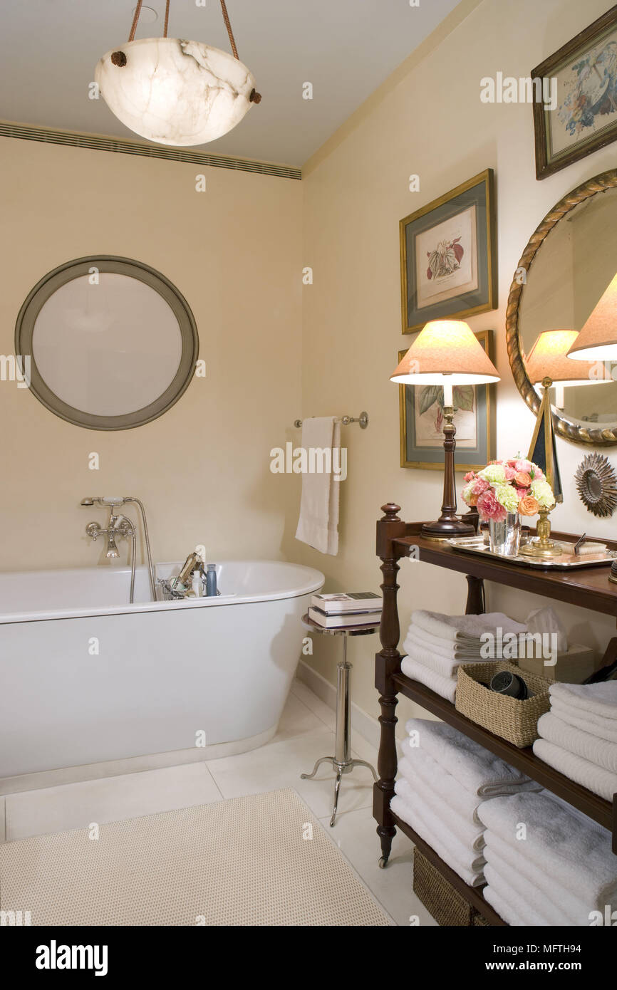 Freestanding bathtub in traditional style bathroom Stock Photo Alamy