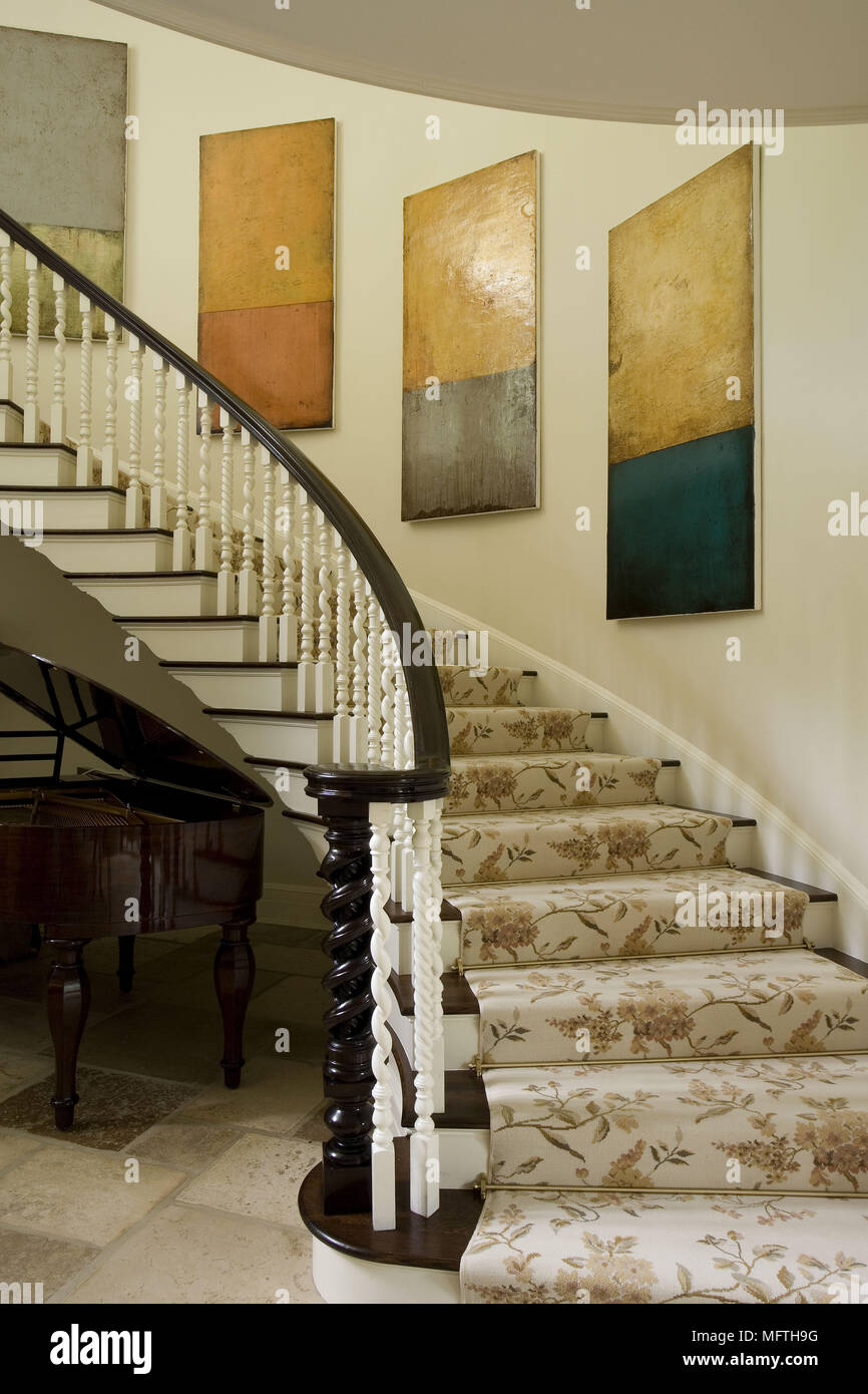 Grand staircase with carpeted stairs Stock Photo