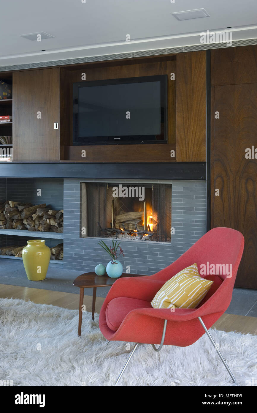 chairs in front of fireplace