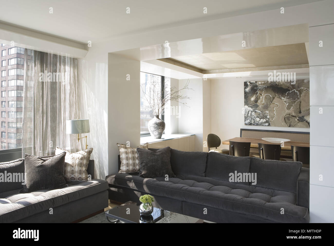 Sofas in modern open plan sitting room Stock Photo Alamy