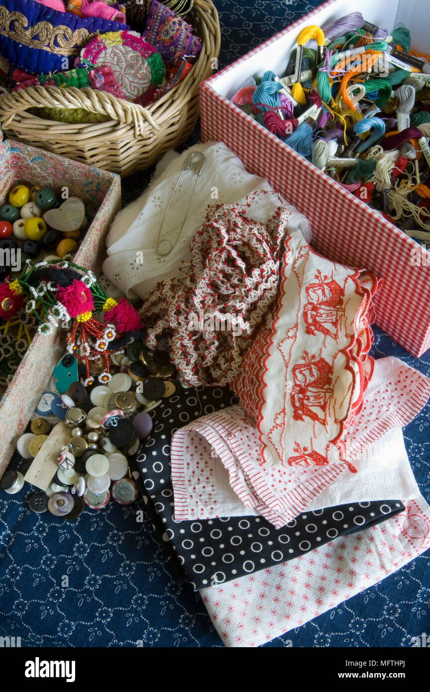 Collection of sewing materials including threads and buttons Stock