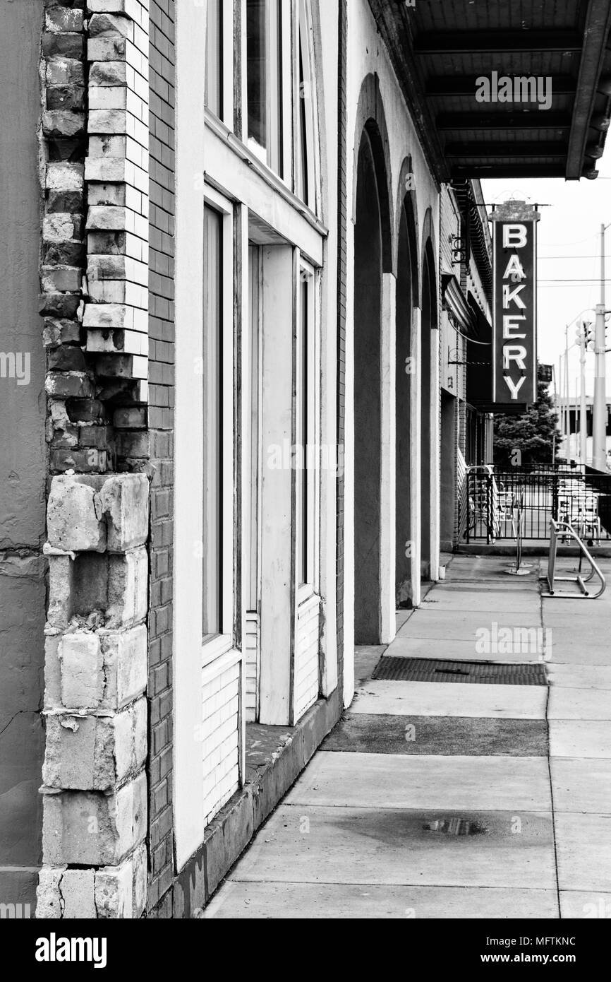 Store Fronts and Bakery Sign in Front of Adrienne and Company on Court Avenue in Jeffersonville Indiana Stock Photo