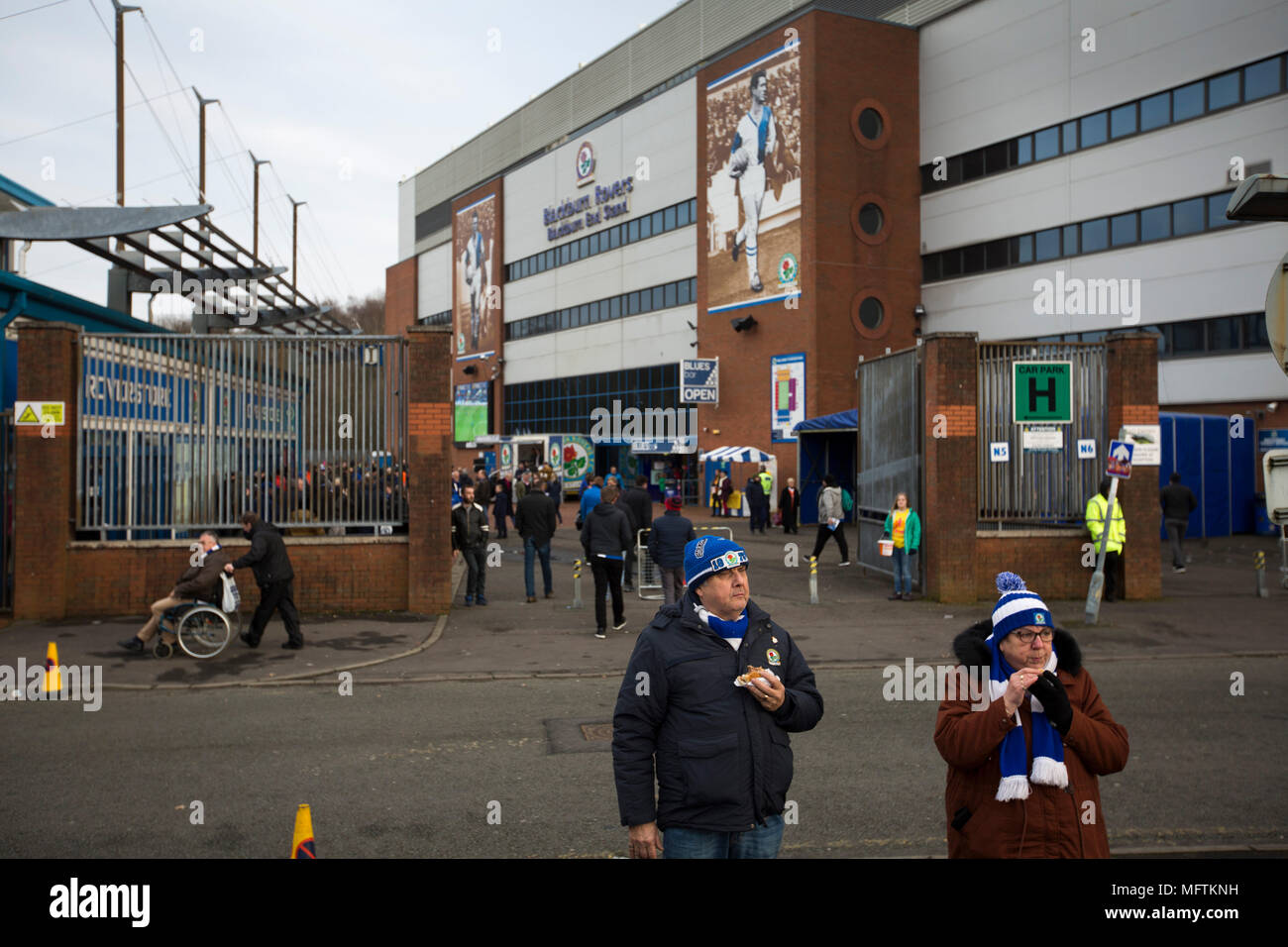 Fans gathering the outside the Blackburn End Stand before Blackburn Rovers played Shrewsbury Town in a Sky Bet League One fixture at Ewood Park. Both team were in the top three in the division at the start of the game. Blackburn won the match by 3 goals to 1, watched by a crowd of 13,579. Stock Photo
