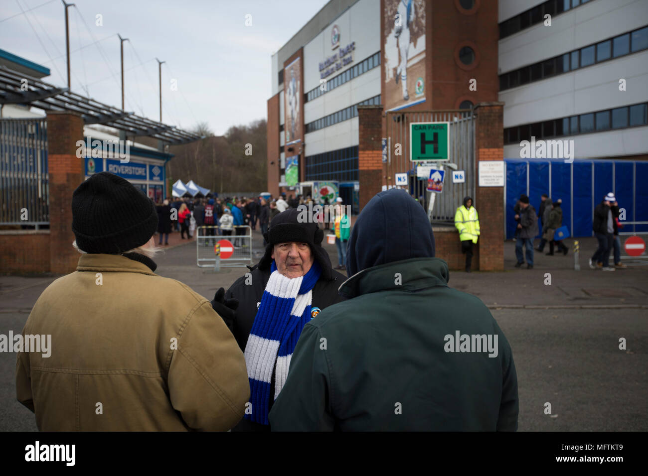 Fans gathering the outside the Blackburn End Stand before Blackburn Rovers played Shrewsbury Town in a Sky Bet League One fixture at Ewood Park. Both team were in the top three in the division at the start of the game. Blackburn won the match by 3 goals to 1, watched by a crowd of 13,579. Stock Photo