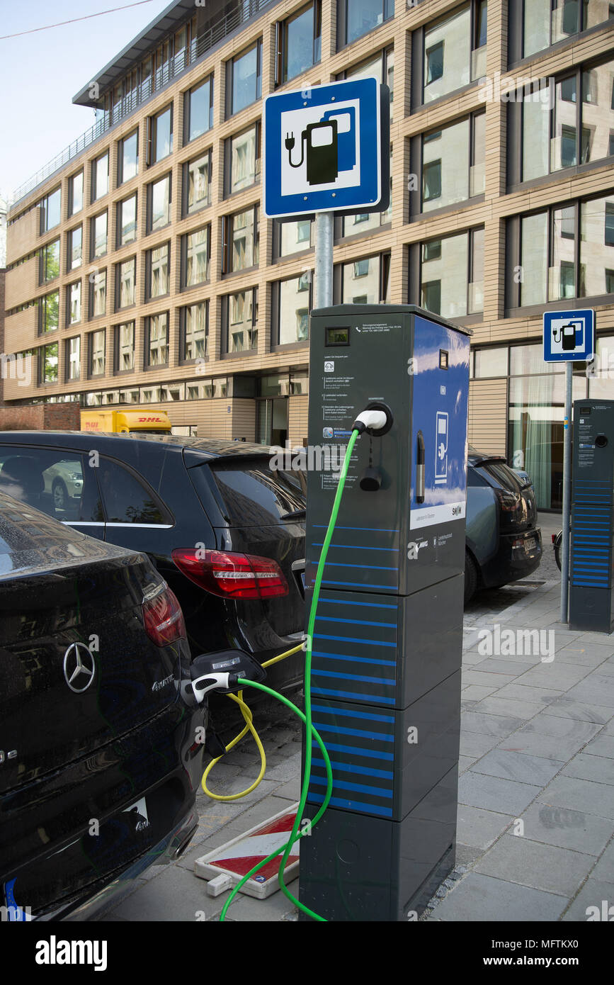 Munich,GermanyApril 26,2018 ECar charging station charging a MercedesBenz car Stock Photo