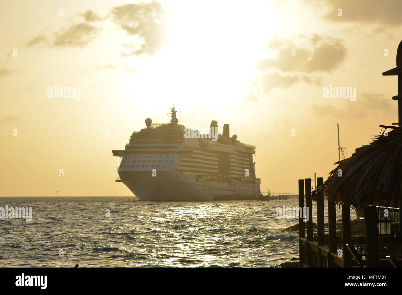 Cruise ship at sunset in the Caribbean Stock Photo - Alamy
