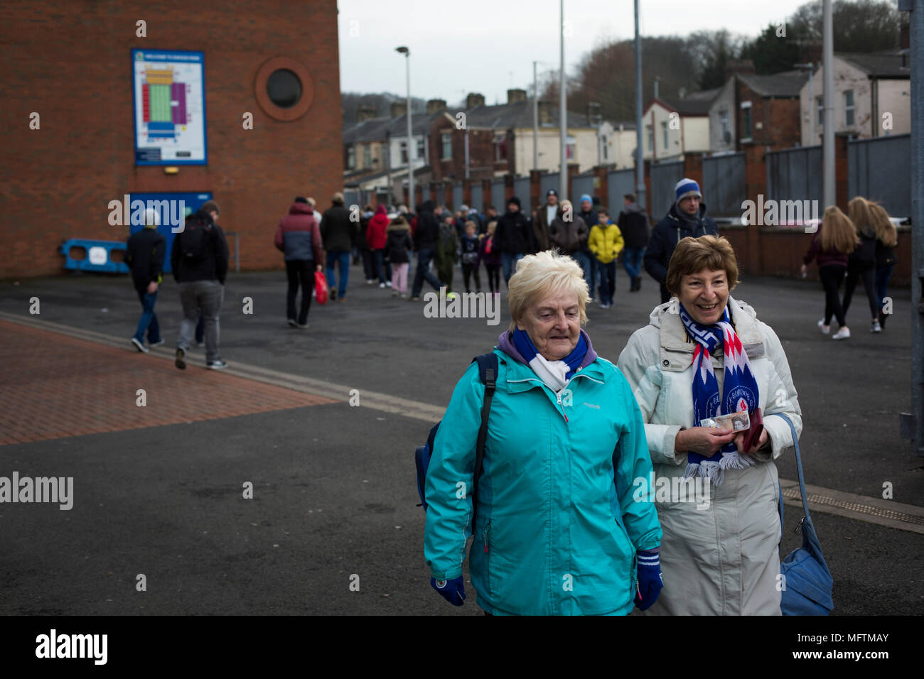Fans walking towards the Blackburn End Stand before Blackburn Rovers played Shrewsbury Town in a Sky Bet League One fixture at Ewood Park. Both team were in the top three in the division at the start of the game. Blackburn won the match by 3 goals to 1, watched by a crowd of 13,579. Stock Photo