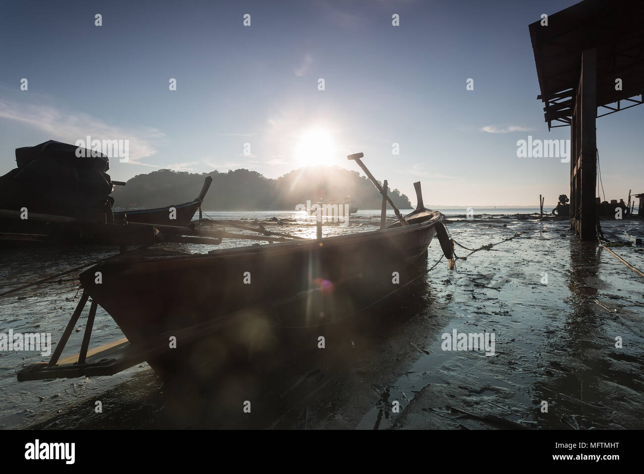 Coastal Fishing Boats on a beach in Silhouette style Stock Photo - Alamy