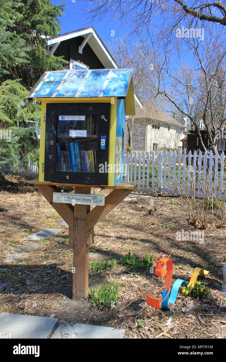 Little free library which gives books away for free to passersby Stock ...