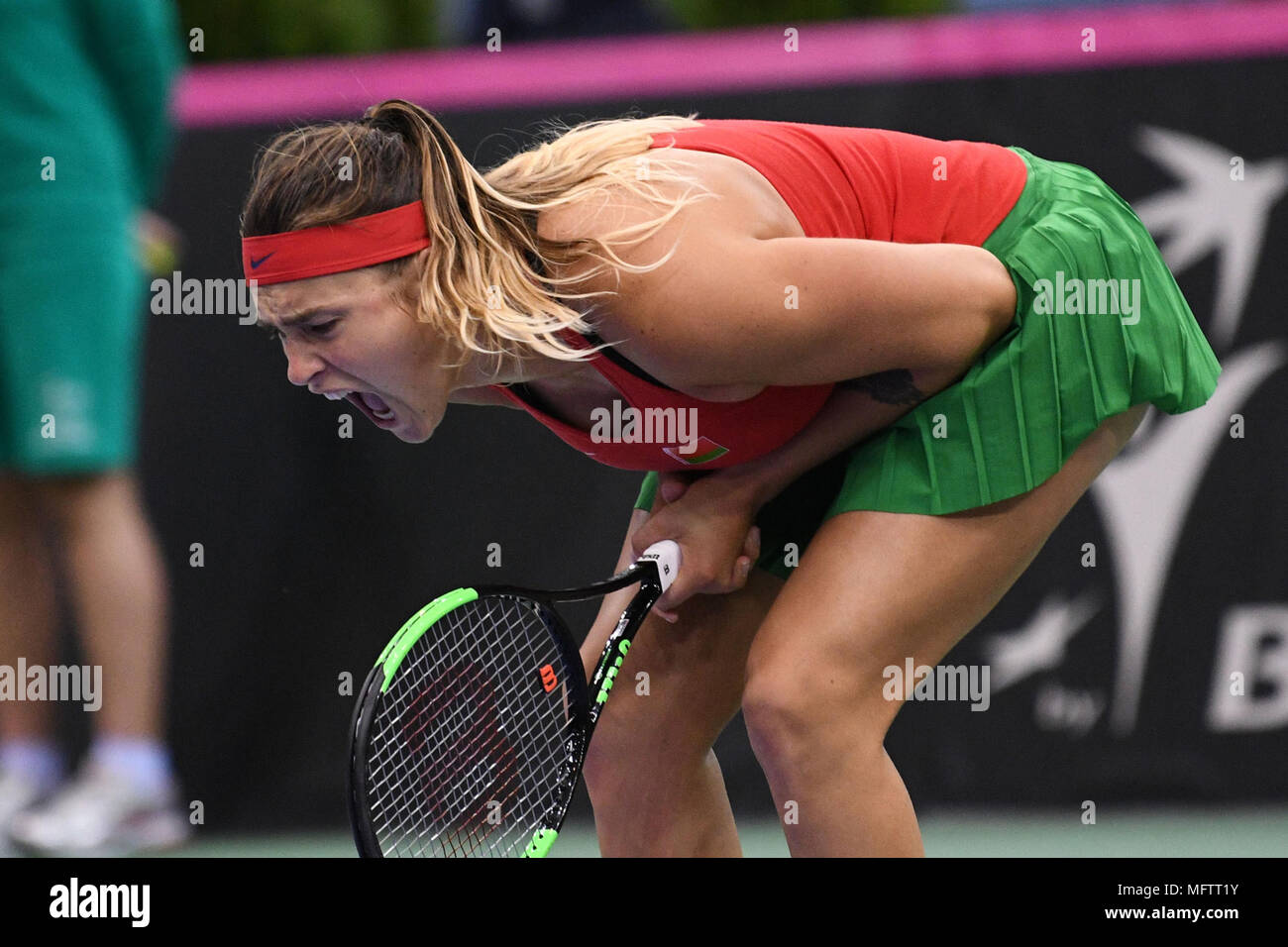 Minsk, Belarus. 21st April, 2018. Aryna Sabalenka (BLR) disappointed in a FedCup match against Vikoria Kuzmova being played at Chizhovka Arena in Minsk, Belarus Stock Photo
